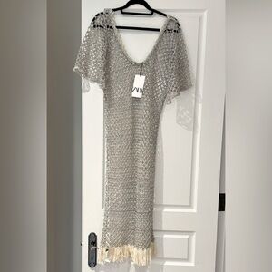 New with tqg open weave beaded tunic